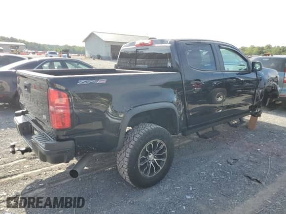 2021 Chevrolet Colorado 4WD ZR2 with VIN 1GCPTEE12M1293033, listed as a Copart auction lot 80183945 with 28,003 mi miles and Salvage title. Bid and sale history available at DreamBid. Image 3.