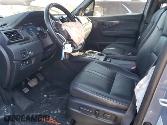 2022 Honda Passport TrailSport with VIN 5FNYF8H62NB004097, listed as a Copart auction lot 52331095 with 27,318 mi miles and Salvage title. Bid and sale history available at DreamBid. Image 7.