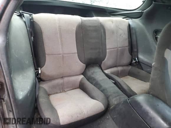 1994 Chevrolet Camaro Z28 z VIN 2G1FP22P4R2105947, wystawiony jako Copart lot #85064294 z przebiegiem 131 315 mil mil oraz Szkoda całkowita • Salvage title. Historia ofert i sprzedaży dostępna na DreamBid. Obrazek 10.