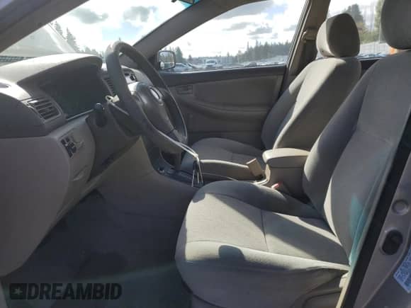 2003 Toyota Corolla CE с VIN 1NXBR32E63Z181946, выставлен на аукционе Copart как лот 85291965 с пробегом 228 378 миль миль и Списание • Salvage title. История ставок и продаж доступна на DreamBid. Изображение 7.