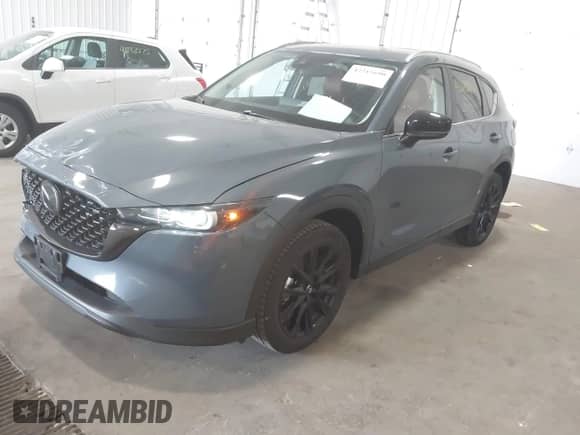 2023 Mazda CX-5 S Carbon Edition z VIN JM3KFBCM8P0261086, wystawiony jako IAAI lot #42215690 z przebiegiem 23 730 mil mil oraz . Historia ofert i sprzedaży dostępna na DreamBid. Obrazek 17.