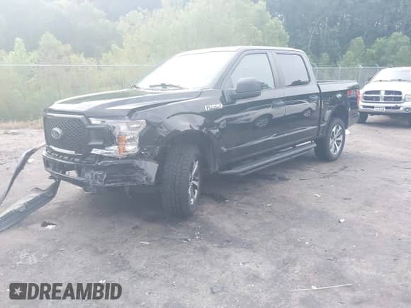 2019 Ford F-150 XL with VIN 1FTEW1E54KFB76726, listed as a IAAI auction lot 42970886 with 128,574 mi miles and . Bid and sale history available at DreamBid. Image 2.