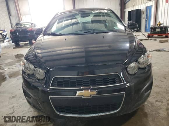 2016 Chevrolet Sonic LS with VIN 1G1JA5SGXG4124989, listed as a Copart auction lot 65783465 with 119,612 mi miles and Clean title. Bid and sale history available at DreamBid. Image 5.
