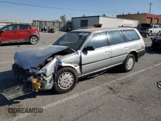 1990 Toyota Camry с VIN JT2SV21W7L0364695, выставлен на аукционе Copart как лот 68265625 с пробегом 262 028 миль миль и Списание • Salvage title. История ставок и продаж доступна на DreamBid. Изображение 1.