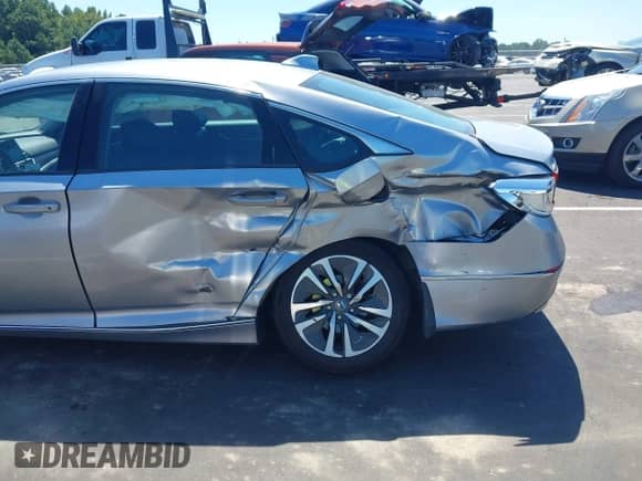 2018 Honda Accord EX-L with VIN 1HGCV3F50JA015873, listed as a IAAI auction lot 43141766 with 152,543 mi miles and . Bid and sale history available at DreamBid. Image 6.