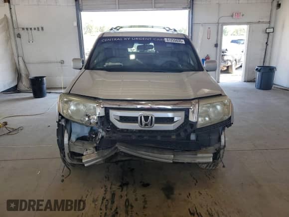 2009 Honda Pilot Touring с VIN 5FNYF48929B002908, выставлен на аукционе Copart как лот 81255035 с пробегом Не указан миль и Списание • Salvage title. История ставок и продаж доступна на DreamBid. Изображение 5.