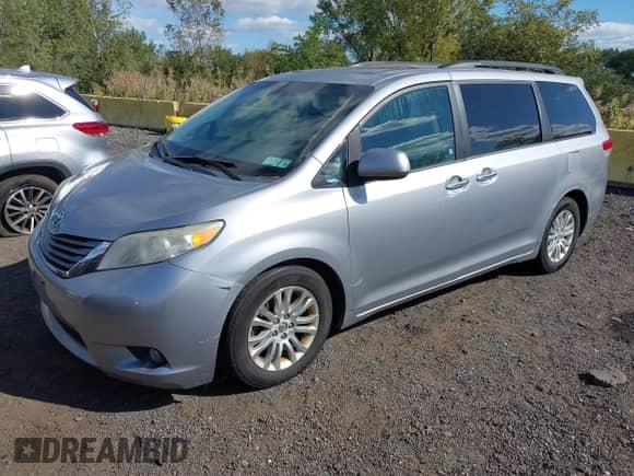 2012 Toyota Sienna XLE with VIN 5TDYK3DCXCS235154, listed as a IAAI auction lot 43366877 with 216,434 mi miles and . Bid and sale history available at DreamBid. Image 17.