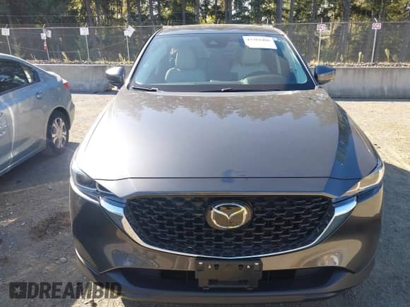 2023 Mazda CX-5 S Carbon Edition z VIN JM3KFBCM6P0143148, wystawiony jako IAAI lot #43382486 z przebiegiem 22 099 mil mil oraz . Historia ofert i sprzedaży dostępna na DreamBid. Obrazek 12.
