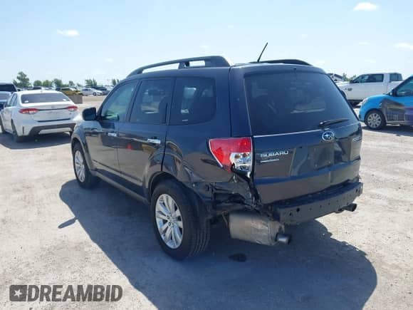 2011 Subaru Forester X Limited with VIN JF2SHBEC4BH757358, listed as a IAAI auction lot 42714447 with 118,001 mi miles and . Bid and sale history available at DreamBid. Image 3.
