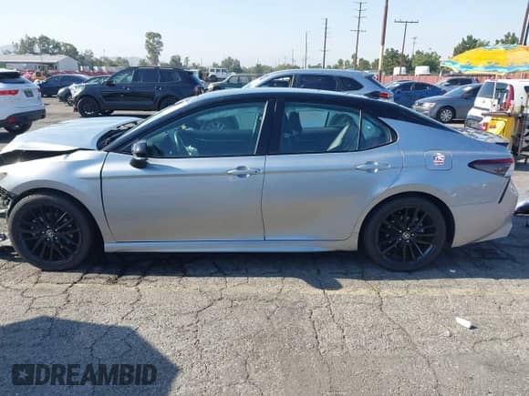 2023 Toyota Camry Hybrid XSE with VIN 4T1K31AK0PU051132, listed as a IAAI auction lot 42945793 with 48,781 mi miles and . Bid and sale history available at DreamBid. Image 15.