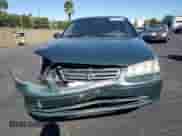 2001 Toyota Camry CE z VIN JT2BG22K410606619, wystawiony jako Copart lot #80817125 z przebiegiem 161 201 mil mil oraz Szkoda całkowita • Salvage title. Historia ofert i sprzedaży dostępna na DreamBid. Obrazek 5.