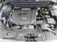 2022 Mazda CX-5 S Carbon Edition z VIN JM3KFBCM9N1538707, wystawiony jako IAAI lot #42026877 z przebiegiem 36 077 mil mil oraz . Historia ofert i sprzedaży dostępna na DreamBid. Obrazek 10.