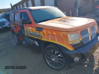 2011 Dodge Nitro SXT z VIN 1D4PU5GK9BW535743, wystawiony jako IAAI lot #41200573 z przebiegiem 155 239 mil mil oraz . Historia ofert i sprzedaży dostępna na DreamBid. Obrazek 1.