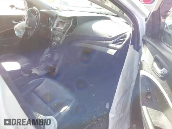 2013 Hyundai Santa Fe Sport z VIN 5XYZUDLA2DG099086, wystawiony jako IAAI lot #43500175 z przebiegiem 64 575 mil mil oraz . Historia ofert i sprzedaży dostępna na DreamBid. Obrazek 5.