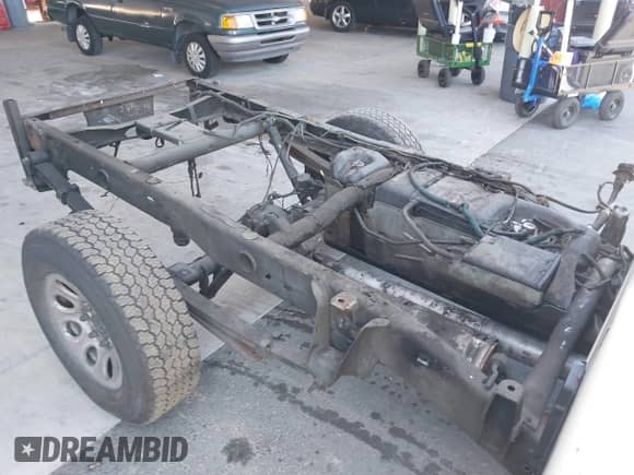 2006 Chevrolet Silverado 1500 Work Truck z VIN 3GCEC14X86G197028, wystawiony jako IAAI lot #42933273 z przebiegiem Nie podano mil oraz . Historia ofert i sprzedaży dostępna na DreamBid. Obrazek 8.