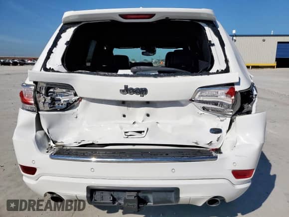 2017 Jeep Grand Cherokee Overland with VIN 1C4RJECG4HC965657, listed as a Copart auction lot 84400635 with 141,055 mi miles and Salvage title. Bid and sale history available at DreamBid. Image 6.