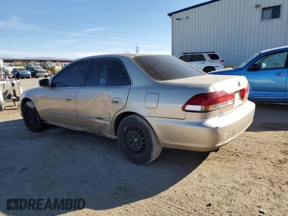 2002 Honda Accord LX with VIN 1HGCG16492A016527, listed as a Copart auction lot 47138135 with 165,298 mi miles and Salvage title. Bid and sale history available at DreamBid. Image 2.