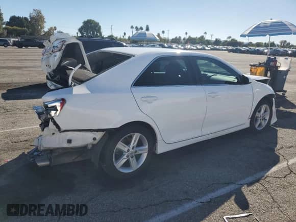 2012 Toyota Camry SE with VIN 4T1BF1FK5CU197813, listed as a Copart auction lot 86599095 with 148,917 mi miles and Salvage title. Bid and sale history available at DreamBid. Image 3.