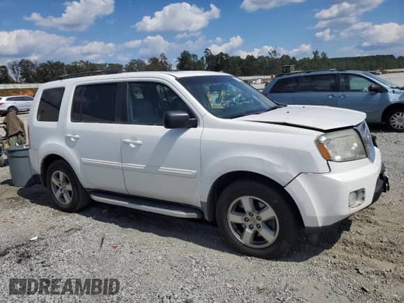 2011 Honda Pilot EX-L с VIN 5FNYF4H73BB029569, выставлен на аукционе Copart как лот 80734085 с пробегом 194 309 миль миль и Списание • Salvage title. История ставок и продаж доступна на DreamBid. Изображение 4.