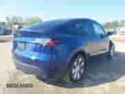 2023 Tesla Model Y Long Range with VIN 7SAYGDEE4PA125024, listed as a IAAI auction lot 43252218 with 21,200 mi miles and . Bid and sale history available at DreamBid. Image 4.