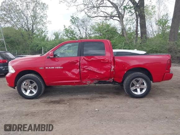 2011 Ram 1500 SLT with VIN 1D7RV1CTXBS557421, listed as a IAAI auction lot 42149415 with 119,968 mi miles and . Bid and sale history available at DreamBid. Image 14.