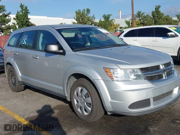 2014 Dodge Journey American Value with VIN 3C4PDCAB3ET241677, listed as a IAAI auction lot 43508874 with 167,198 mi miles and . Bid and sale history available at DreamBid. Image 1.