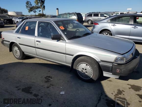 1988 Toyota Camry с VIN JT2SV24E5J3276324, выставлен на аукционе Copart как лот 88117355 с пробегом 89 928 миль миль и Списание • Salvage title. История ставок и продаж доступна на DreamBid. Изображение 4.