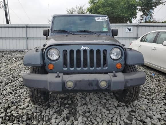 2007 Jeep Wrangler Unlimited Rubicon with VIN 1J8GA69167L145281, listed as a Copart auction lot 68919235 with 148,839 mi miles and Clean title. Bid and sale history available at DreamBid. Image 5.