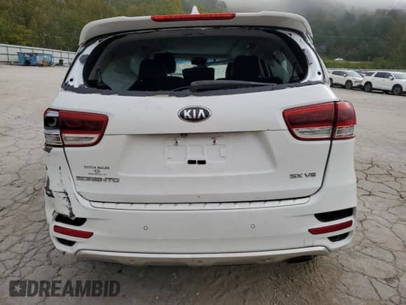 2016 Kia Sorento SX z VIN 5XYPK4A50GG184242, wystawiony jako Copart lot #84772345 z przebiegiem 59 287 mil mil oraz Szkoda całkowita • Salvage title. Historia ofert i sprzedaży dostępna na DreamBid. Obrazek 6.
