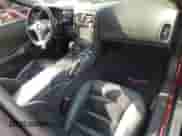 2010 Chevrolet Corvette 1LT with VIN 1G1YE2DW7A5101466, listed as a Copart auction lot 77403254 with 46,060 mi miles and Salvage title. Bid and sale history available at DreamBid. Image 8.