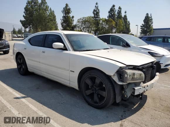 2009 Dodge Charger R/T with VIN 2B3KA53T39H513701, listed as a Copart auction lot 68700635 with 203,541 mi miles and Salvage title. Bid and sale history available at DreamBid. Image 4.