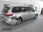 2015 Toyota Sienna L with VIN 5TDZK3DCXFS572089, listed as a IAAI auction lot 43201327 with 120,641 mi miles and . Bid and sale history available at DreamBid. Image 4.