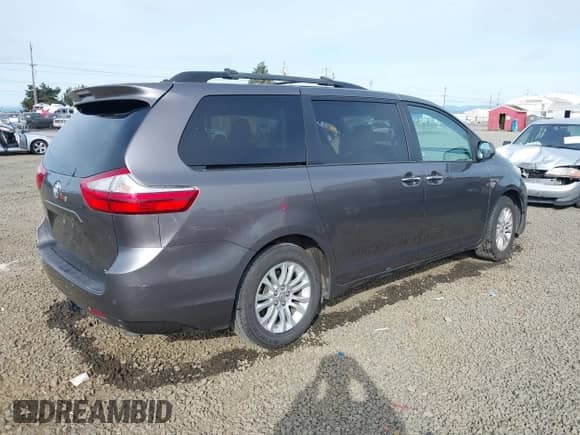 2016 Toyota Sienna XLE with VIN 5TDYK3DC0GS734079, listed as a IAAI auction lot 39151054 with 108,850 mi miles and . Bid and sale history available at DreamBid. Image 4.