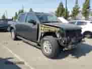 2015 Nissan Frontier SV with VIN 1N6AD0ER5FN720550, listed as a Copart auction lot 68286465 with 61,657 mi miles and Salvage title. Bid and sale history available at DreamBid. Image 4.