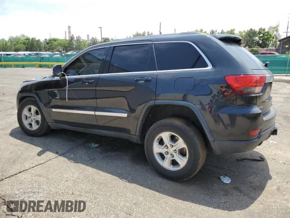 2012 Jeep Grand Cherokee Laredo с VIN 1C4RJEAT6CC301188, выставлен на аукционе Copart как лот 59602325 с пробегом 163 126 миль миль и Списание • Salvage title. История ставок и продаж доступна на DreamBid. Изображение 2.