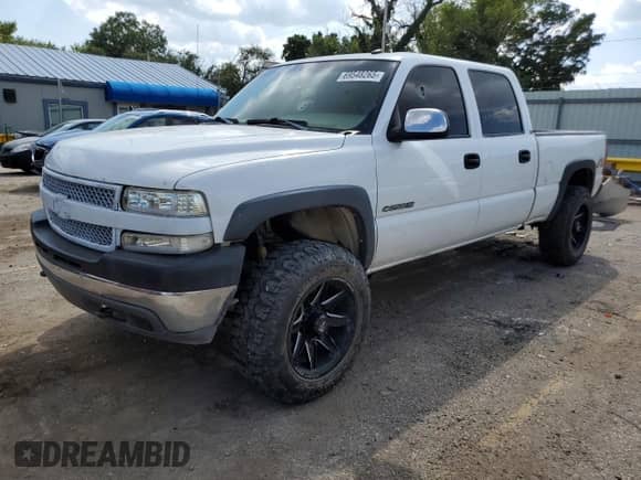 2002 Chevrolet Silverado 2500HD LS с VIN 1GCHK23U02F244772, выставлен на аукционе Copart как лот 69548265 с пробегом Не указан миль и Списание • Salvage title. История ставок и продаж доступна на DreamBid. Изображение 1.
