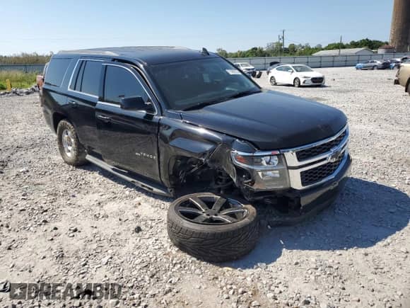 2017 Chevrolet Tahoe LS с VIN 1GNSCAKC5HR229012, выставлен на аукционе Copart как лот 71495175 с пробегом 151 837 миль миль и Списание • Salvage title. История ставок и продаж доступна на DreamBid. Изображение 4.