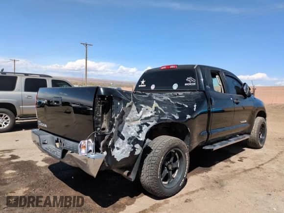 2012 Toyota Tundra z VIN 5TFRU5F10CX028076, wystawiony jako Copart lot #50353735 z przebiegiem 171 321 mil mil oraz Szkoda całkowita • Salvage title. Historia ofert i sprzedaży dostępna na DreamBid. Obrazek 14.