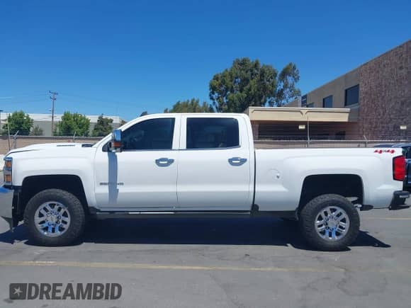 2018 Chevrolet Silverado 2500HD LTZ с VIN 1GC1KWEY3JF276719, выставлен на аукционе IAAI как лот 42923749 с пробегом 183 716 миль миль и . История ставок и продаж доступна на DreamBid. Изображение 14.