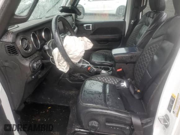 2022 Jeep Wrangler Unlimited Sahara with VIN 1C4JJXP61NW159845, listed as a Copart auction lot 86151705 with 63,224 mi miles and Salvage title. Bid and sale history available at DreamBid. Image 7.