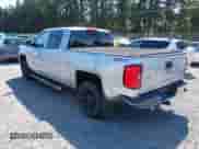 2014 Chevrolet Silverado 1500 LTZ with VIN 1GCUKSEC4EF197043, listed as a IAAI auction lot 42673341 with 131,445 mi miles and . Bid and sale history available at DreamBid. Image 3.