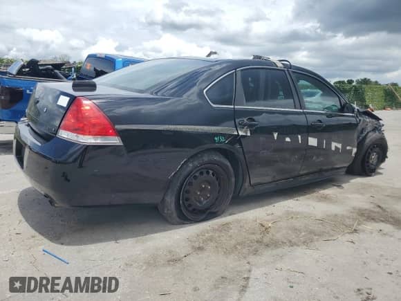 2015 Chevrolet Impala Police Police с VIN 2G1WD5E34F1161097, выставлен на аукционе Copart как лот 60245564 с пробегом Не указан миль и Списание • Salvage title. История ставок и продаж доступна на DreamBid. Изображение 3.