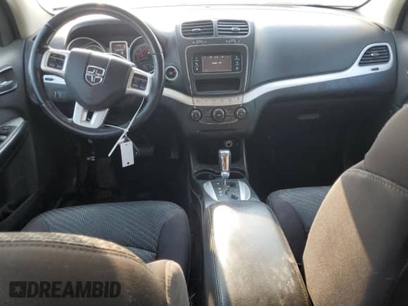 2013 Dodge Journey SXT with VIN 3C4PDCBB6DT706871, listed as a Copart auction lot 63473065 with 114,213 mi miles and Salvage title. Bid and sale history available at DreamBid. Image 8.