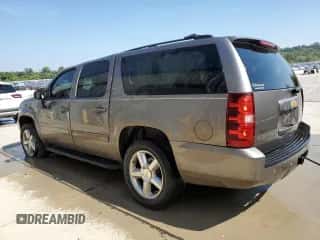 2011 Chevrolet Suburban LT с VIN 1GNSKJE34BR305972, выставлен на аукционе Copart как лот 80532575 с пробегом 219 069 миль миль и Списание • Salvage title. История ставок и продаж доступна на DreamBid. Изображение 2.