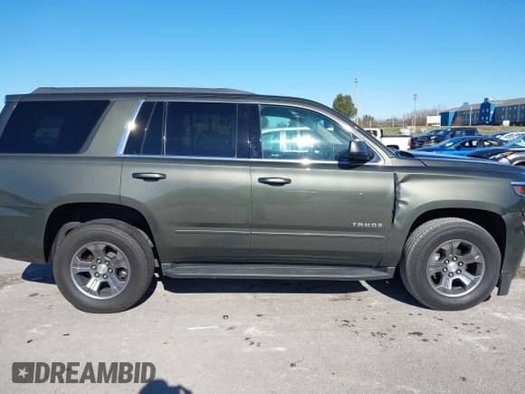 2019 Chevrolet Tahoe LS with VIN 1GNSKAKC4KR226743, listed as a IAAI auction lot 40839068 with 104,220 mi miles and . Bid and sale history available at DreamBid. Image 14.