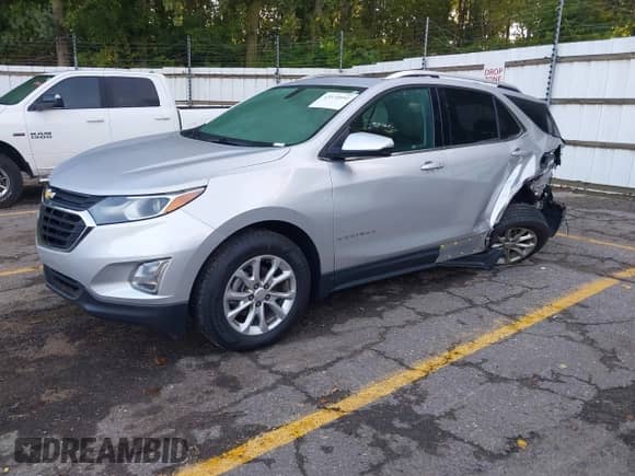 2018 Chevrolet Equinox LT z VIN 2GNAXSEV5J6246266, wystawiony jako IAAI lot #43139092 z przebiegiem 104 464 mil mil oraz . Historia ofert i sprzedaży dostępna na DreamBid. Obrazek 2.