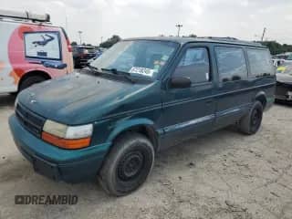 1995 Dodge Grand Caravan with VIN 1B4GH243XSX576483, listed as a Copart auction lot 67218245 with 194,729 mi miles and Salvage title. Bid and sale history available at DreamBid. Image 1.