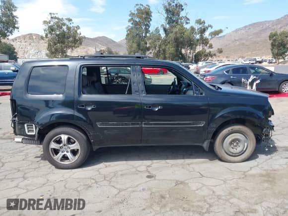 2013 Honda Pilot EX-L with VIN 5FNYF3H58DB019857, listed as a IAAI auction lot 43050717 with 152,188 mi miles and . Bid and sale history available at DreamBid. Image 14.