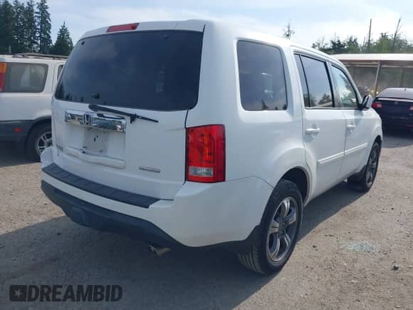 2015 Honda Pilot SE with VIN 5FNYF3H35FB031126, listed as a IAAI auction lot 42509887 with 117,090 mi miles and . Bid and sale history available at DreamBid. Image 4.