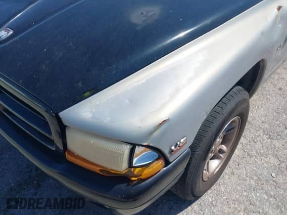 2000 Dodge Dakota Sport with VIN 1B7GL2AX6YS644891, listed as a IAAI auction lot 41961323 with 194,210 mi miles and . Bid and sale history available at DreamBid. Image 13.